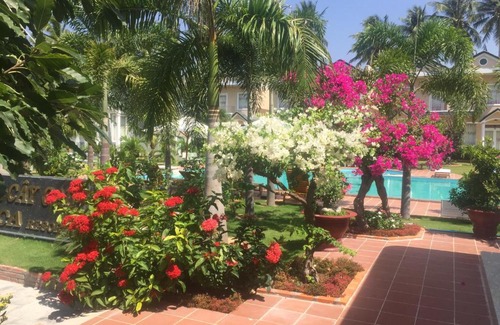 Ho Tram Resort | Relax at Areca Resort: Family-Friendly with Pool & Hot Tub