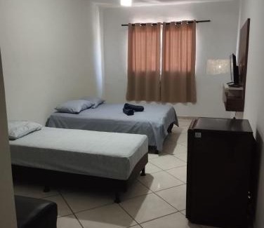 Praia de Itaparica Hotel | Budget-Friendly Stay at Hospedagem Rouxinol - Family Welcome