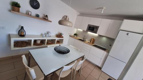 Poris de Abona Apartment | Oceanfront Haven at Arenas del Porís - Rated 9/10 by Guests
