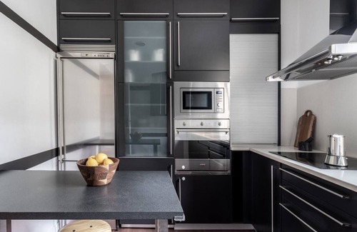 Almagro Apartment | Inviting Argento: 3 Bedrooms with Spa and Pet-Friendly Perks