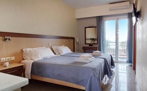 Skala Kallonis Apartment | Enjoy Oceanfront Relaxation at Arisvi All Seasons Hotel