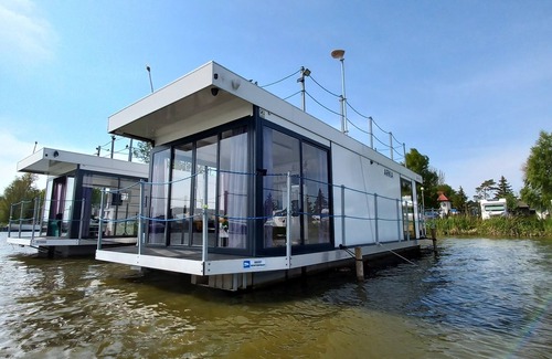 Mielno Boat Rental | Pet-Friendly Retreat: Arka Water Cabins with Pool & Spa