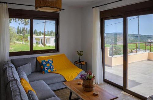 Monolithos House | Experience Arsithea Villa: Oceanfront Retreat with Pool