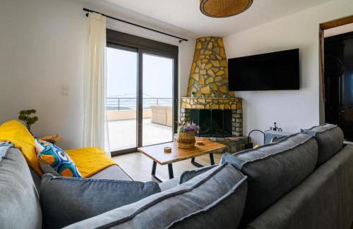 Monolithos House | Experience Arsithea Villa: Oceanfront Retreat with Pool
