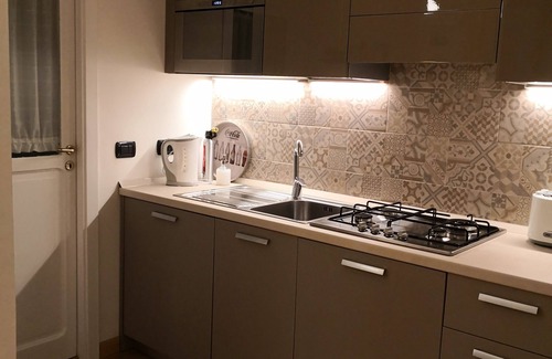 Montecalvario House | Explore Art and Tradition in a Two-Room Apartment