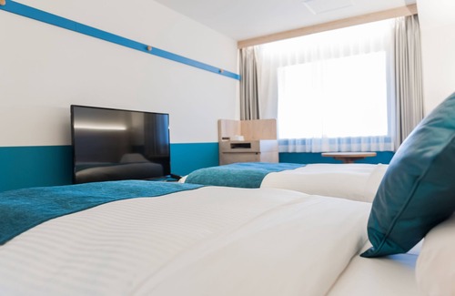 Asahikawa Hotel | Art Hotel Asahikawa: Family-Friendly Stay with Spa & Dining