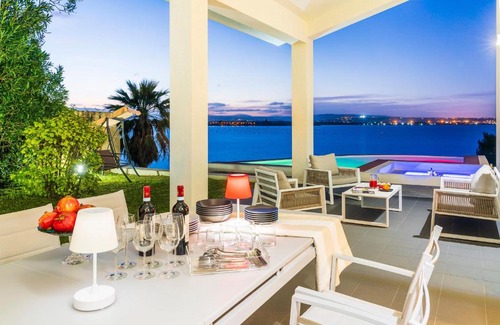 Syracuse Villa | Relax at Artemare: Oceanfront Oasis with Pool Access