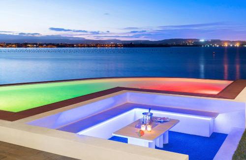 Syracuse Villa | Relax at Artemare: Oceanfront Oasis with Pool Access