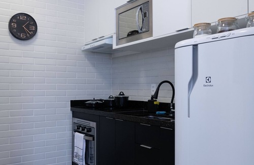 Santo Cristo Apartment | Discover Artinn: Family-Friendly Stay with Kitchen Amenities