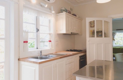 Rosebud House | Artistic Retreat with Ocean Views & Pet-Friendly Amenities