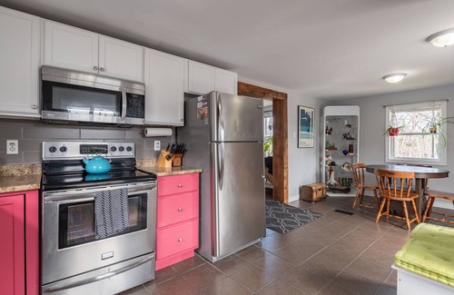 Newport Landing House | Artistic Escape: Nature Retreat with Hot Tub & Firepit