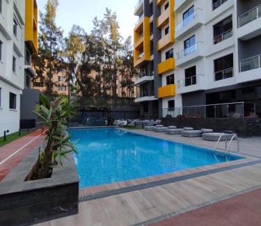 Kilimani Apartment | Artsy & spacious studio with Pool, Gym & Sauna