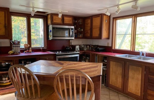 Parsonsfield Cabin | Artsy Woodland Retreat with Ocean and Lake Views