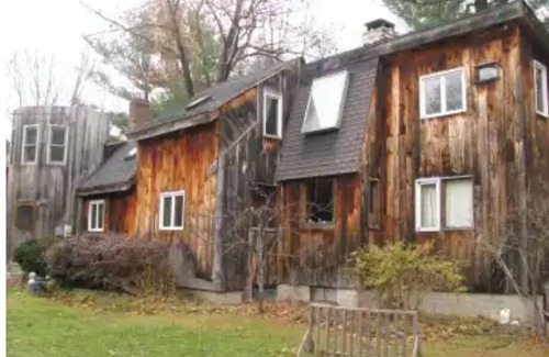 Parsonsfield Cabin | Artsy Woodland Retreat with Ocean and Lake Views