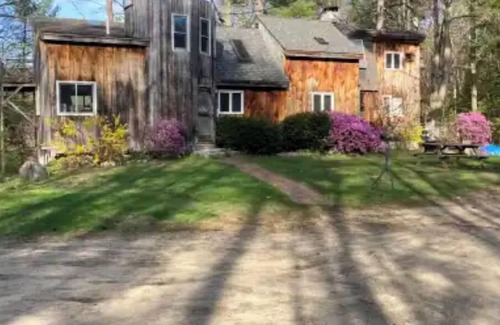 Parsonsfield Cabin | Artsy Woodland Retreat with Ocean and Lake Views