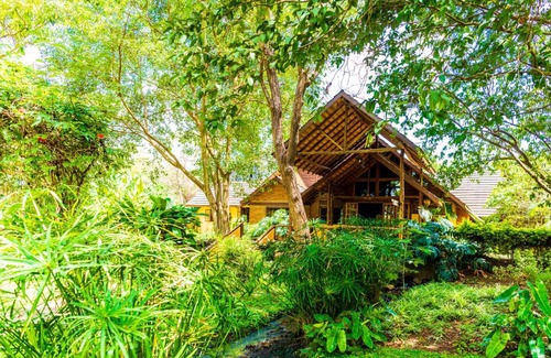 Arusha Cabin | Discover Arumeru River Lodge: 4-Star Retreat with Pool