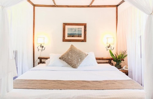 Arusha Cabin | Discover Arumeru River Lodge: 4-Star Retreat with Pool