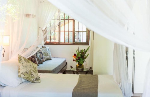 Arusha Cabin | Discover Arumeru River Lodge: 4-Star Retreat with Pool