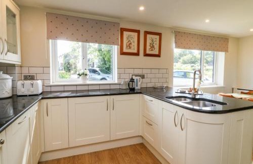 Bradworthy House | Discover Ash Tree Cottage: 4-Star Ocean View Retreat