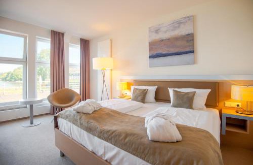 Suedstadt Hotel | Relax at Aspria Hannover: 4-Star Retreat with Ocean Views