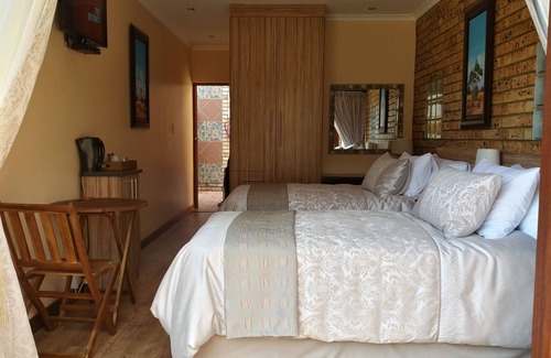 Vanderbijlpark House | Discover Astoni: Family-Friendly Hotel with Pool & Dining