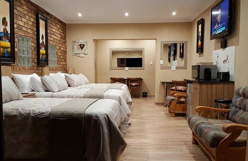 Vanderbijlpark House | Discover Astoni: Family-Friendly Hotel with Pool & Dining