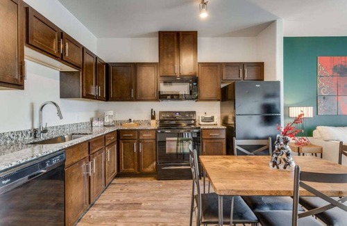 McNeil Apartment | CozySuites on I-35: Pool, Spa & Family-Friendly Amenities
