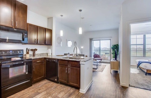 McNeil Apartment | Relaxing Suites on I-35 with Pool and Family-Friendly Perks
