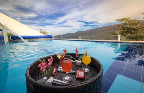 Ouro Preto House | Ideal Retreat for 8: Pool, Ocean View & Game Room