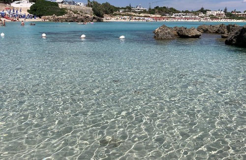 Pulsano Apartment | Cozy Studio Apartment Near Beaches with Child-Friendly Amenities