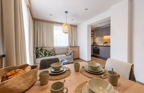 Bruck an der Grossglocknerstrasse Apartment | Cozy Apartment for 4 with Balcony, Pets Welcome & Parking
