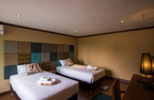 Wua Lai Hotel | Child-Friendly Comfort at At Ease Bijou - Rated 8/10
