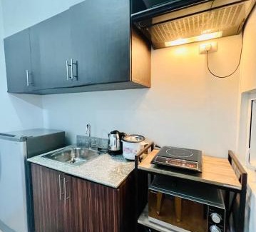 Muntinlupa Apartment | Cozy Condo with Free Pool Access for Families and Pets