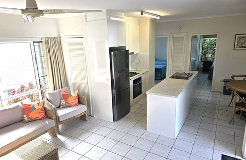 Port Douglas Apartment | Relax at The Mango Tree: Oceanfront Retreat with Spa