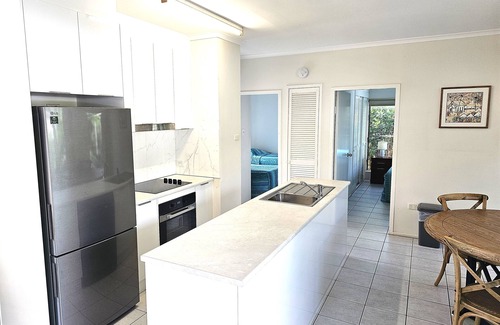 Port Douglas Apartment | Relax at The Mango Tree: Oceanfront Retreat with Spa