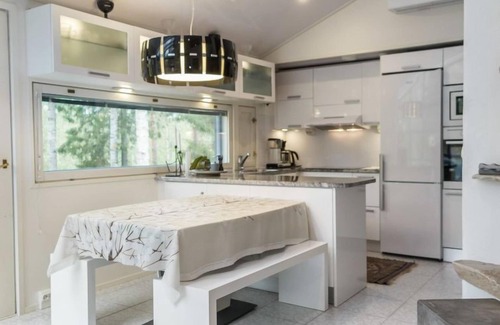 Tahkovuori House | Elegant Lake View Retreat at Atelje 4 by Interhome