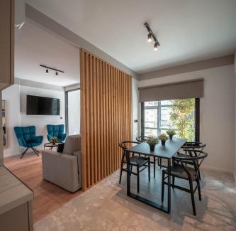 Kinosargous Hotel | Elegant Athesense Suites with Oceanfront Views & Pool