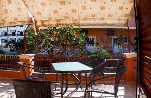 Agios Georgios Pagon Apartment | Idyllic Athina Studios with Oceanfront Views and Breakfast