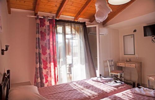 Agios Georgios Pagon Apartment | Idyllic Athina Studios with Oceanfront Views and Breakfast