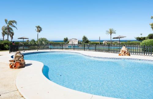 Atlanterra Apartment | Relax at Atico Zahara Playa with Pool & Family Amenities