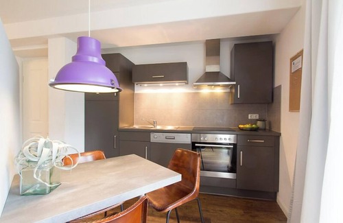 Warnemuende Apartment | Discover Atlantic: Your Riverside Retreat with Breakfast