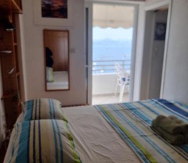 Loutraki-Agioi Theodoroi Apartment | Beautiful Atlas Apartment with Private Beach & Sea Views
