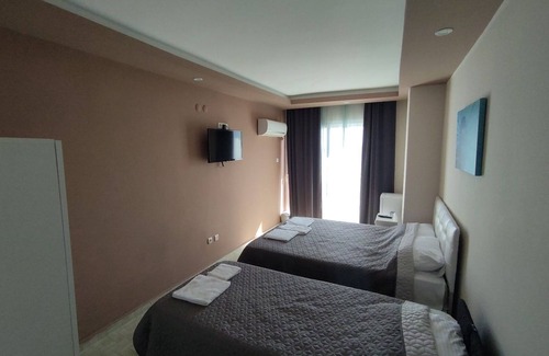 Artikli Hotel | Discover ATLAS BUTİK OTEL: Relax by the Pool & Dine Well