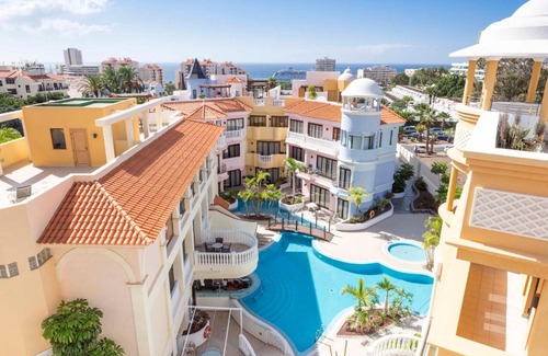 Los Cristianos Resort | Discover Atlas Suites Tenerife: Family-Friendly & Pool Access