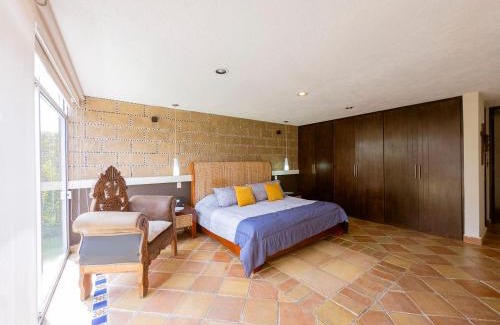 Atlixco House | Discover Atlixco House: Pool, Garden & Rooftop Retreat
