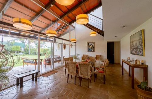 Atlixco House | Discover Atlixco House: Pool, Garden & Rooftop Retreat