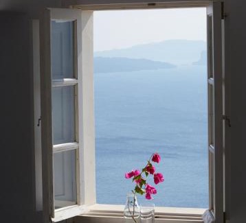 Oia Apartment | Experience Atrina Canava 1894: Oceanfront Paradise Awaits