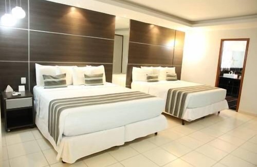 Parauapebas Hotel | Inviting Atrium Confort Hotel Parauapebas with Pool & Spa