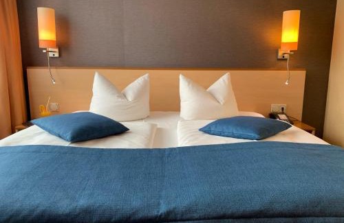 Rostock Hotel | Oceanfront Atrium Hotel Krüger with Pool & Spa Amenities
