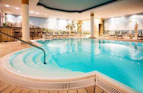 Rostock Hotel | Oceanfront Atrium Hotel Krüger with Pool & Spa Amenities